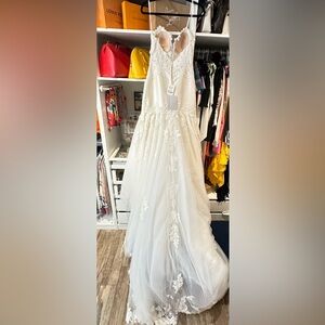 Brand new never used Martina Liana Dress style 905. Size 10.